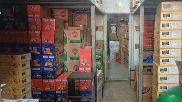 کشف انبار میلیاردی مواد غذایی احتکارشده در آستانه اشرفیه