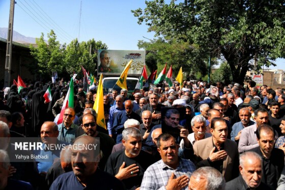 تشییع پیکر شهید ایزدی(حاج رمضان) در سنقر و کلیایی کرمانشاه
