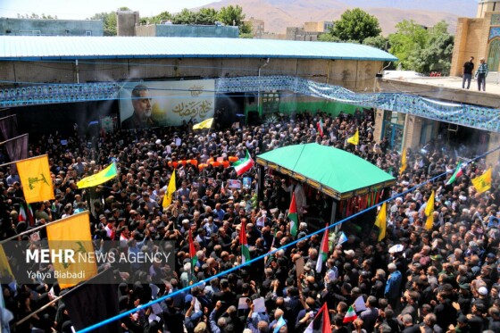 تشییع پیکر شهید ایزدی(حاج رمضان) در سنقر و کلیایی کرمانشاه