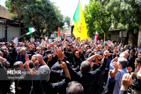 تشییع پیکر شهید ایزدی(حاج رمضان) در سنقر و کلیایی کرمانشاه