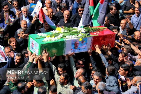 تشییع پیکر شهید ایزدی(حاج رمضان) در سنقر و کلیایی کرمانشاه