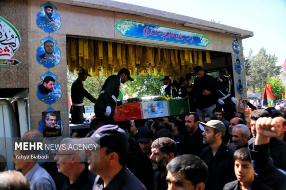 تشییع پیکر شهید ایزدی(حاج رمضان) در سنقر و کلیایی کرمانشاه