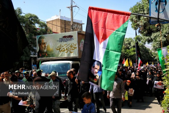 تشییع پیکر شهید ایزدی(حاج رمضان) در سنقر و کلیایی کرمانشاه