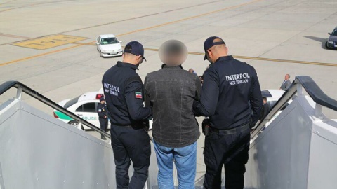 قاتل فراری به کشور مسترد شد