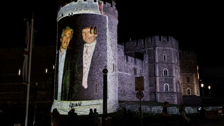 اعتراض به سفر ترامپ با نمایش تصویر او با متهم جنسی بر قلعه وینزور