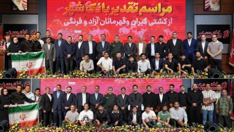 تجلیل از ستاره‌های کشتی در ساختمان مرکزی بانک شهر