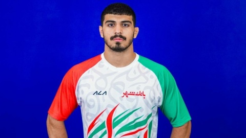 قهرمان آسیا و تقدیم مدال به شهدای میناب