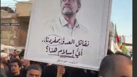 ادای احترام عراقیها به شهید لاریجانی